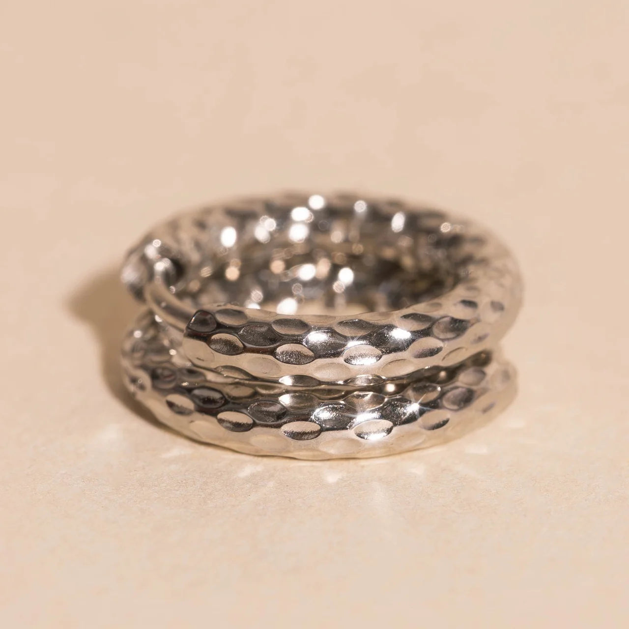 hammered chunky rounded hoop earrings | silver