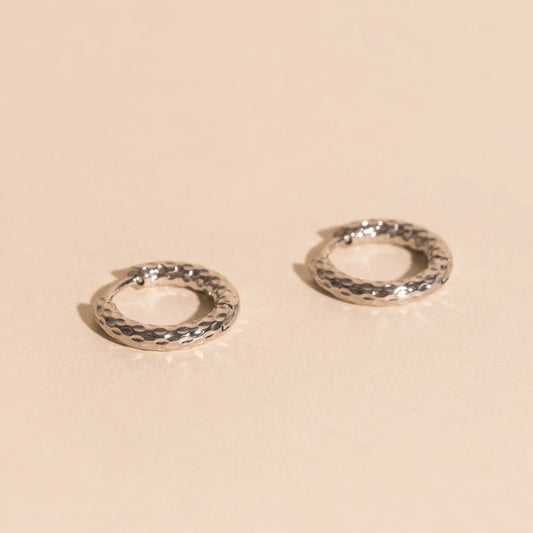 hammered chunky rounded hoop earrings | silver
